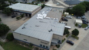 Roof showing hail damage with bruised shingles and dents in Austin, TX